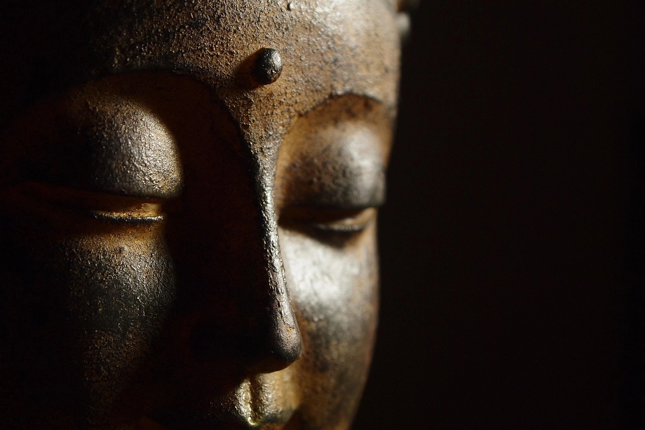 an image of a Buddha statue symbolizing relaxation